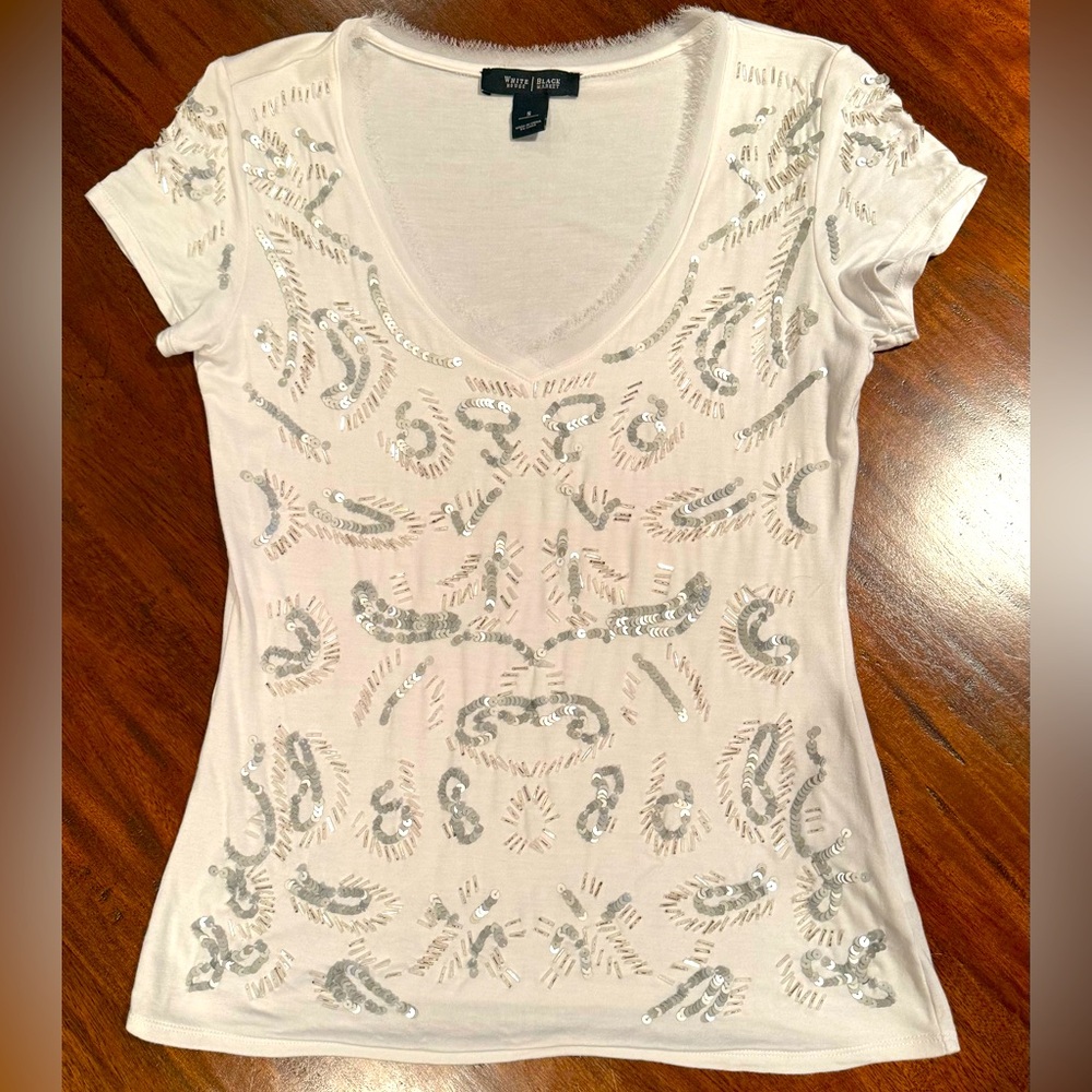 White House Black Market. White t-shirt with sequins. Size small. Like new!